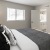 Bedroom with natural lighting and high ceilings